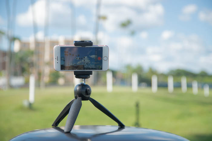 a phone on a tripod outdoors to shoot iphone time lapse photography