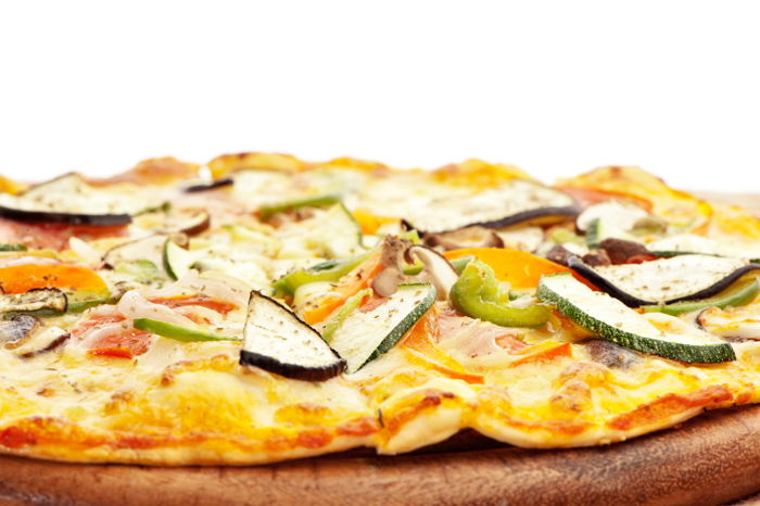 Close-up photo of a pizza on a plate