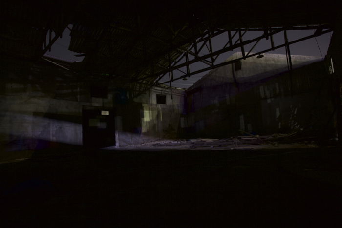 Photo of an abandoned building at nighttime