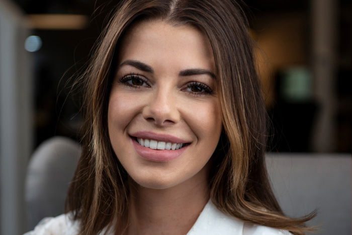 Close-up portrait of a woman with white balance filter