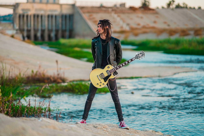 Photo of a man starting with a guitar