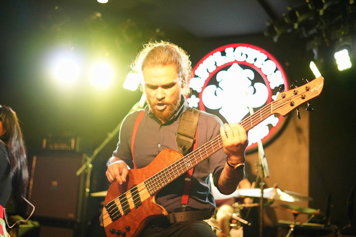 Concert photo of a man playing the guitar