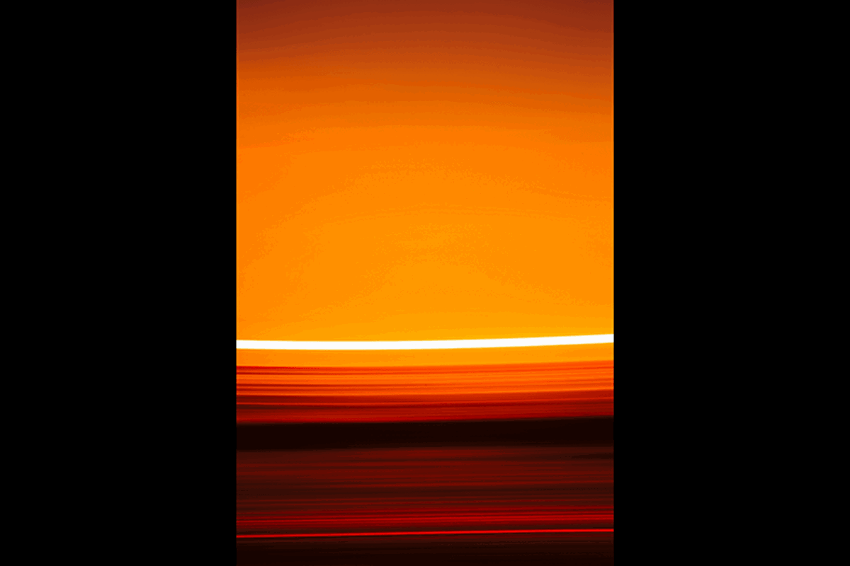 An abstract sunset made with an intentional camera movement pan