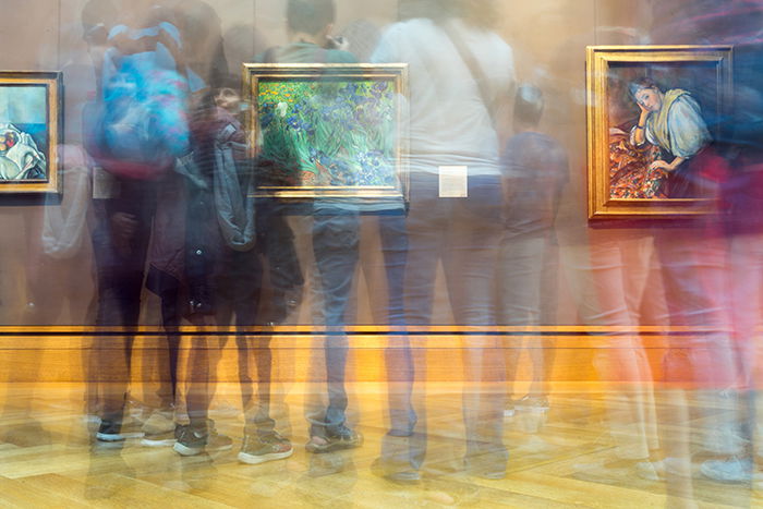 Motion blur photo of a crowd at a museum