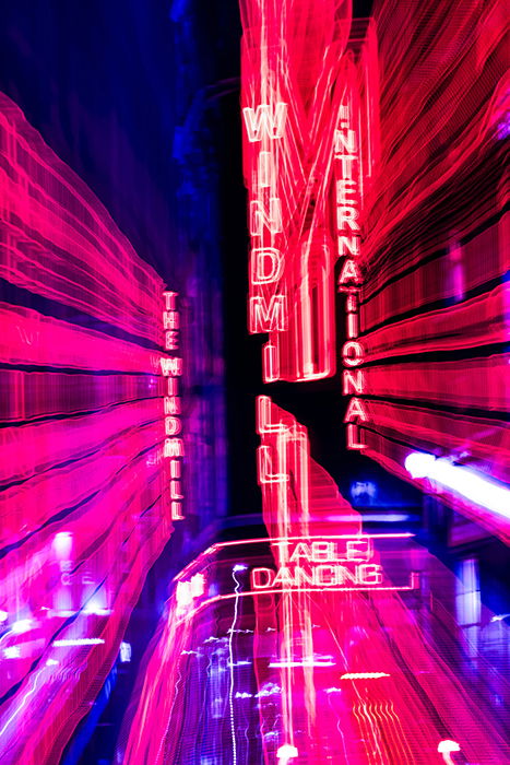 Motion blur photo of neon lights