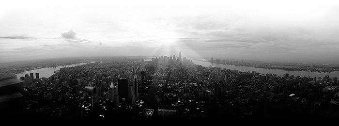 a black and white shot of a sprawling cityscape