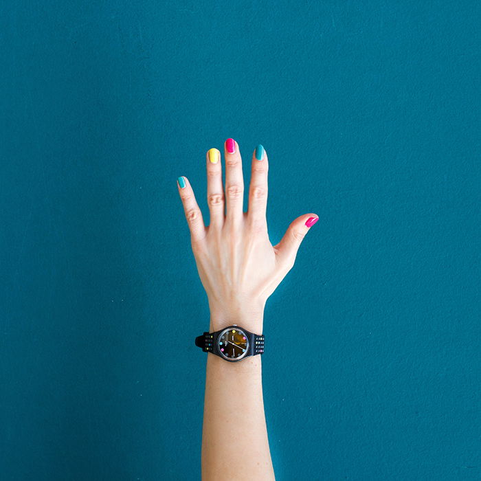 cool overhead picture of nails painted in different bright colors