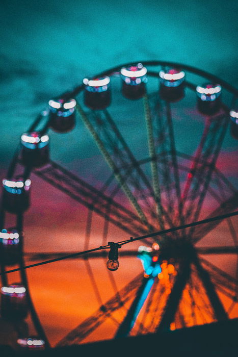 Photo of a ferris wheel at sunset