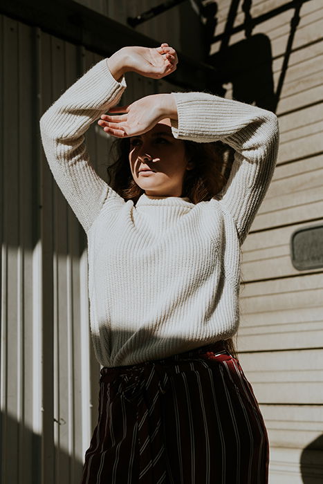 A front view shot of a girl in direct natural light