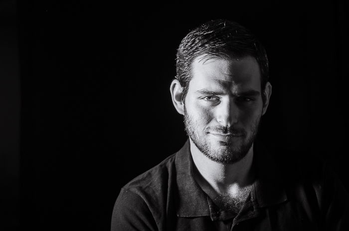 Black and white portrait photo of a man