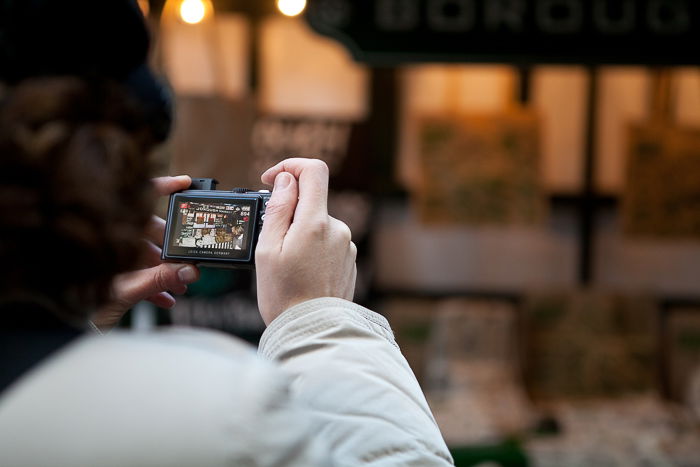 a street image being shot through a digital camera