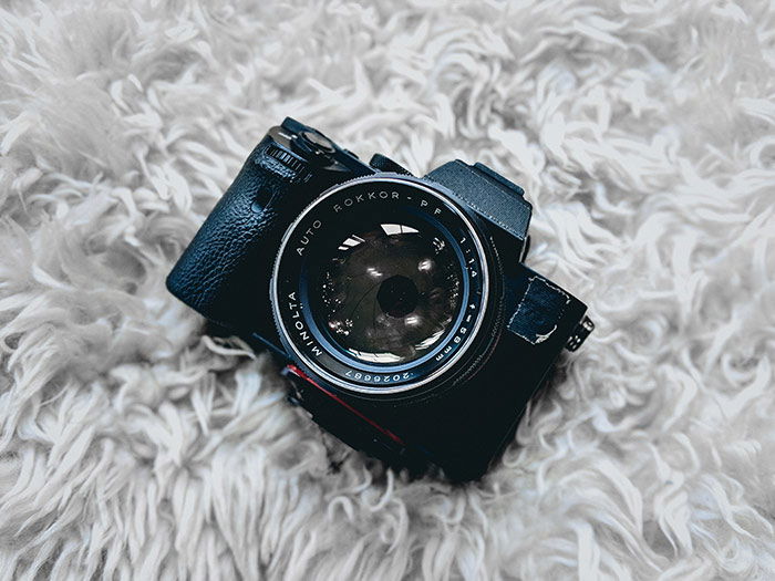 A close-up of a camera on a wooly blanket