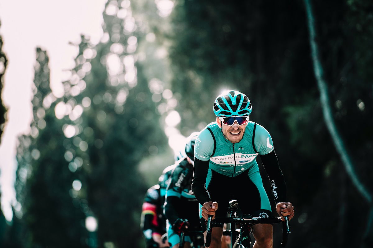 Close-up of a lead cyclist grimacing as an example of cyclist photography