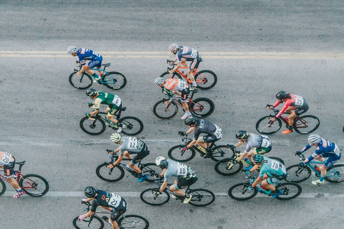 A group of road race cyclists shot for a birds-eye-view from above