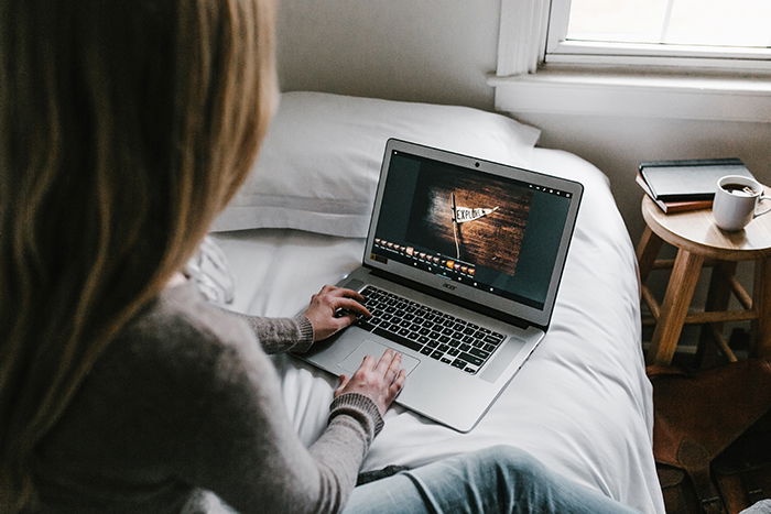 Photo of a woman on her laptop