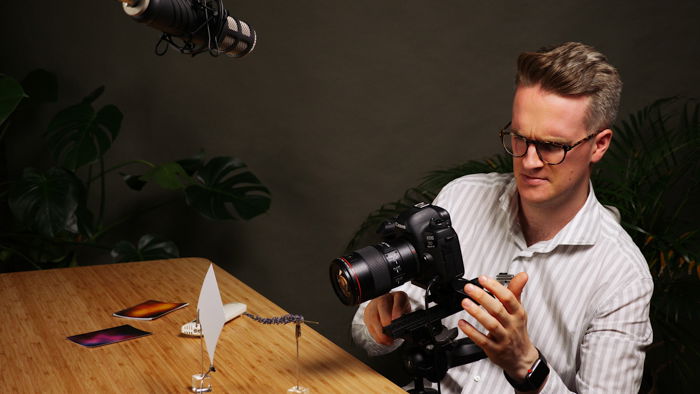 Photo of a man using a macro focusing rail