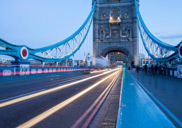 Motion blur of traffic lights on a bridge