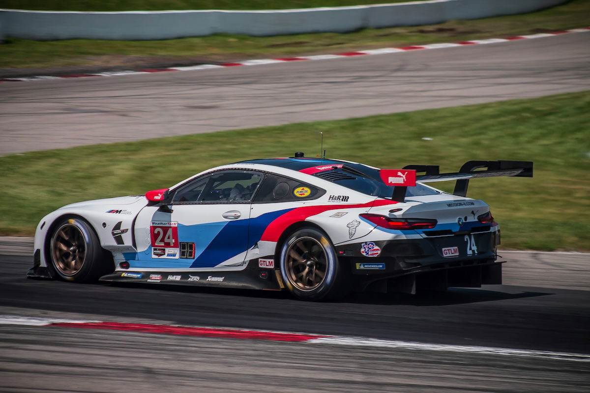 A race car with blurred wheels as an example for motorsports photography