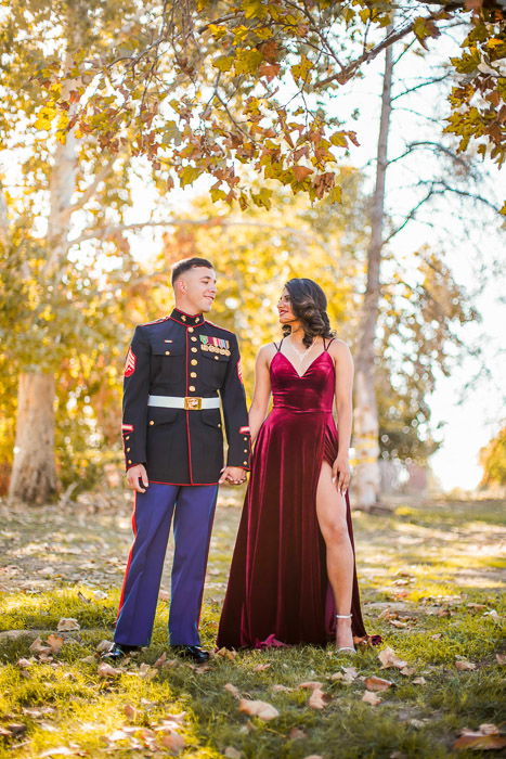 Portrait photo of a couple posing outdoors