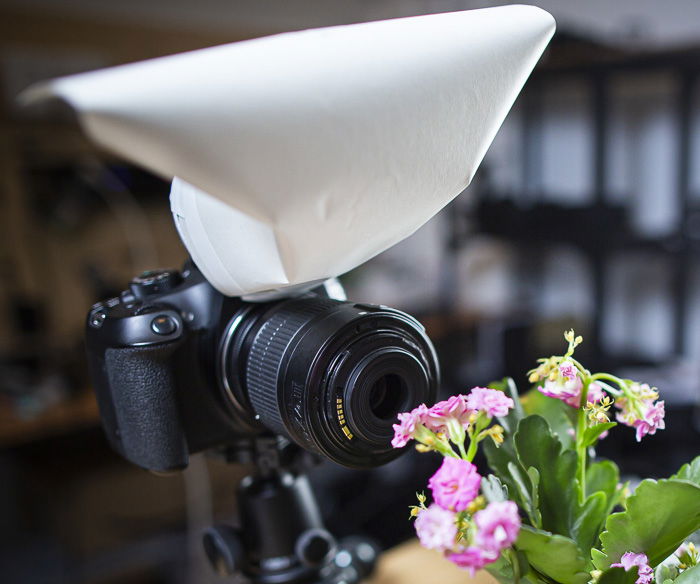 DIY flash diffuser attached to a camera 