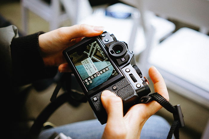 Photo of hand holding a camera