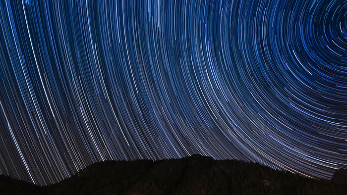 Photo of light painting on the night sky