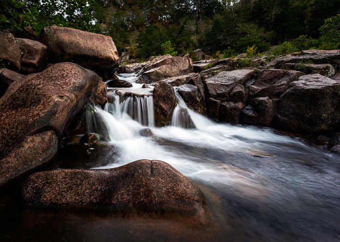 A small waterfall flowing over rocks