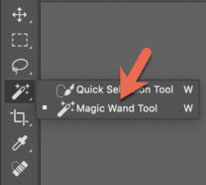 A red arrow pointing to the magic wand selection tool on Photoshop options bar