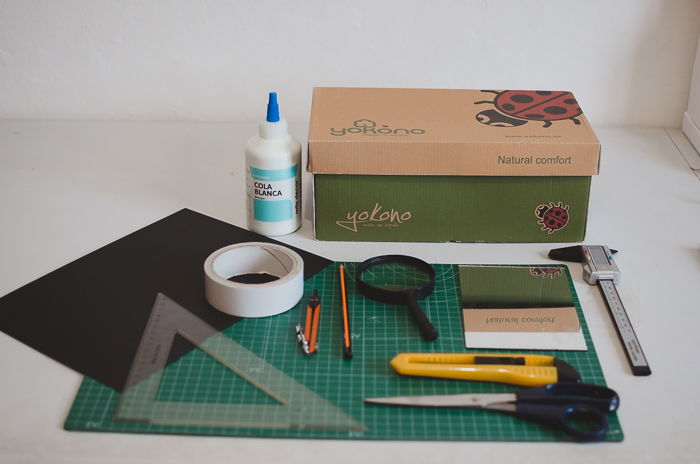 materials for making a smart phone projector including a shoe box, cutting mat, paper, glue and stationary