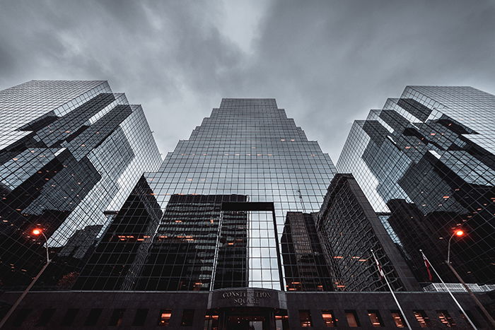 low angle view of multi-windowed skyscrapers 