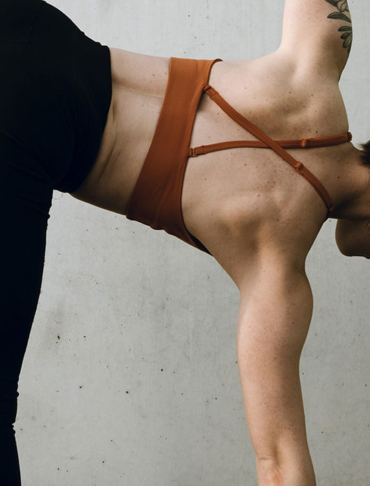 A woman posing for a fitness photoshoot 