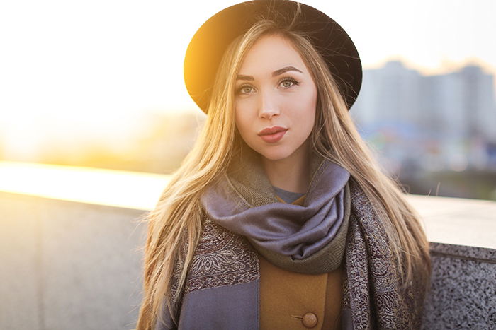 Portrait of a beautiful woman photographed at golden hour.