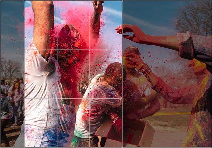 Cropping a photo of paint thrown in the face of a dancer at a local Holi festival in Lightroom