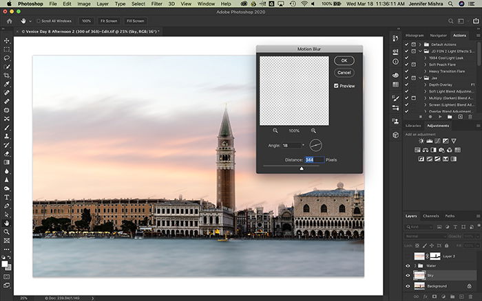 Photoshop screenshot showing sky selected on a new layer and applying 344 pixels of motion blur at an 18 degree angle.