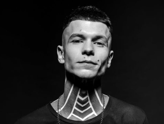 black and white portrait photo of a man with butterfly lighting