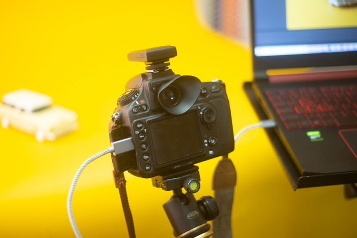 A DSLR tethered to a laptop