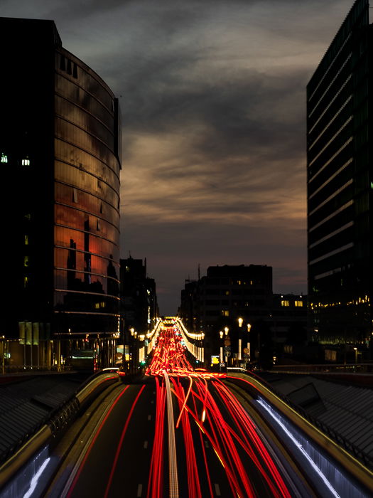 photo of light trails made by cars on a high way