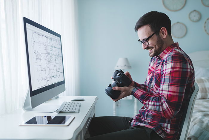 Photographer working on photos.