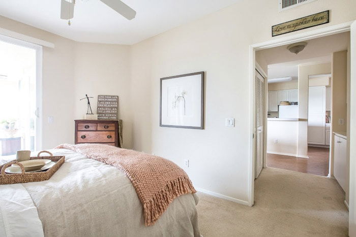 photo of the inside of a bedroom with pastel colors