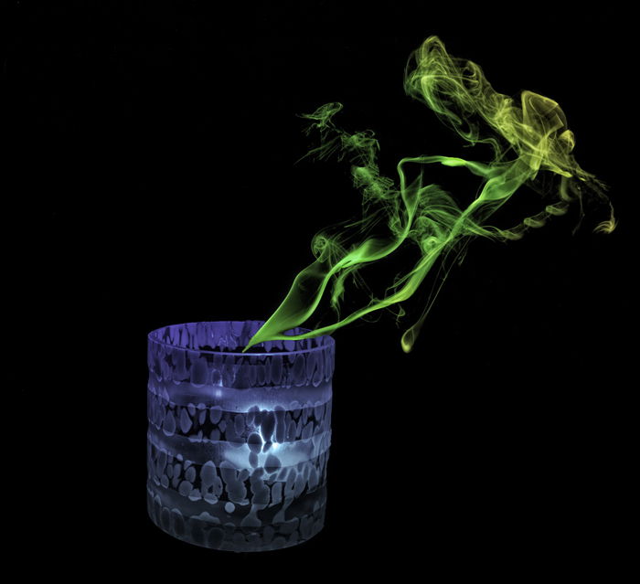 A candle with green smoke