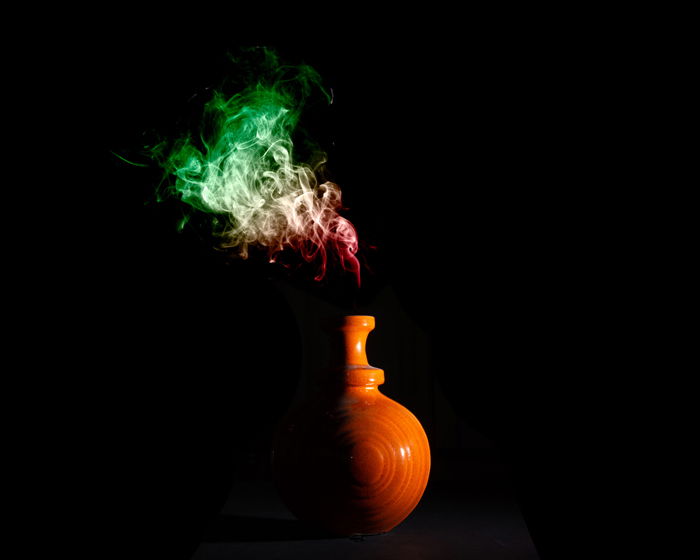  A vase with smoke coming out of it