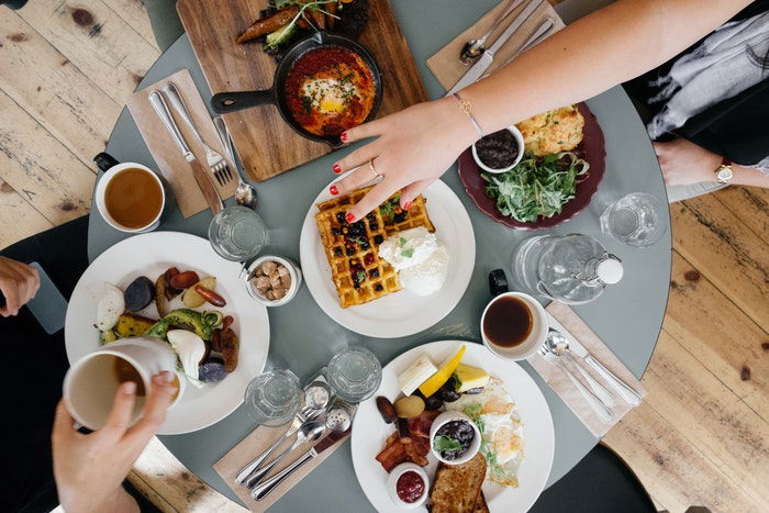 A flat lay of a busy lunch table