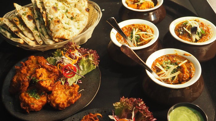 Indian food laid out on a table 