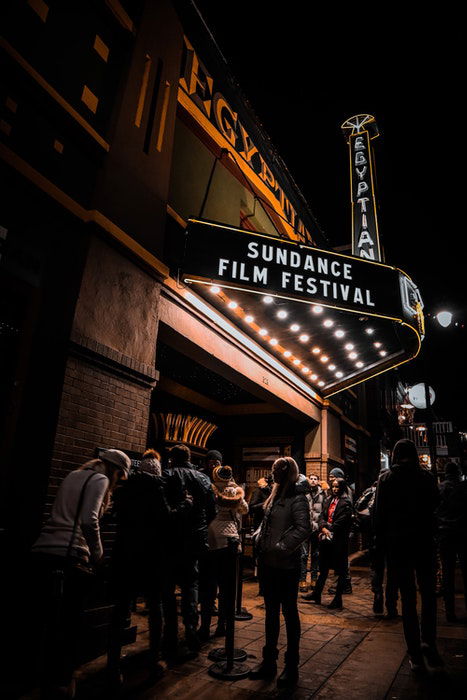 The exterior of a cinema at night