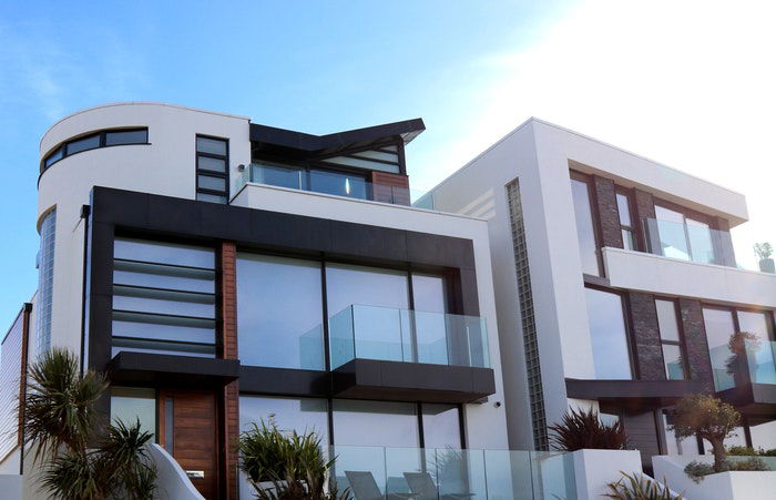 photo of a modern minimalistic house with large windows