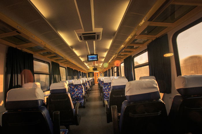 A view from the back seat of a lonely train car