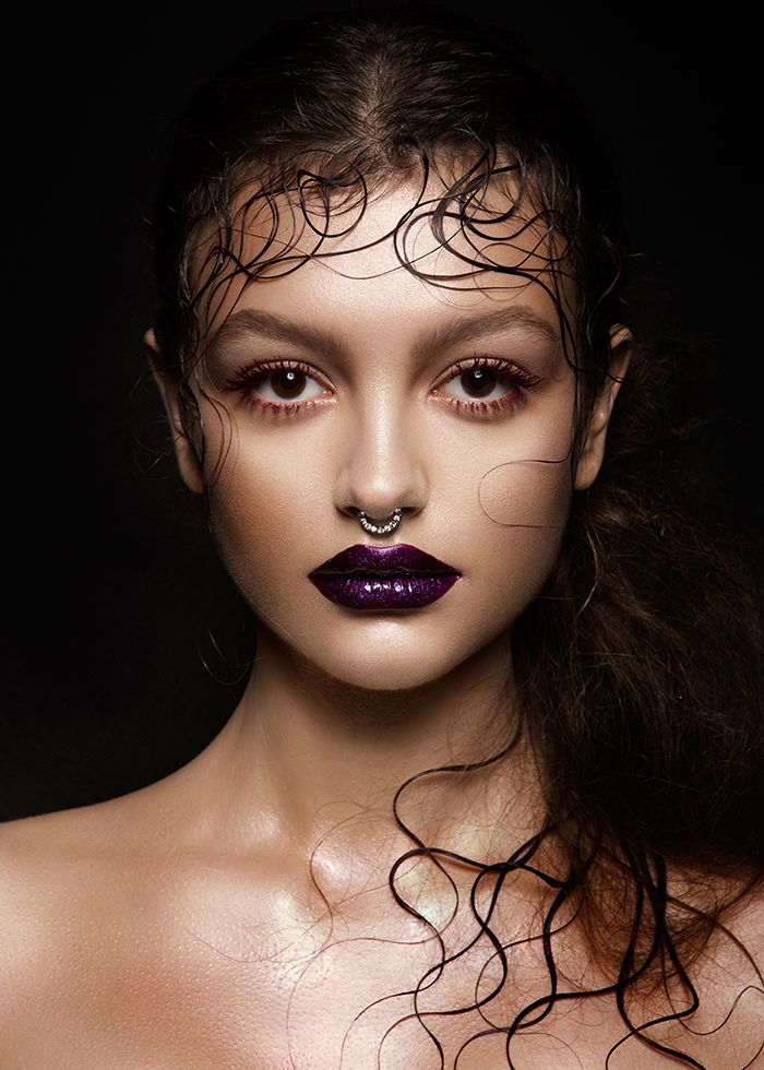 High-fashion portrait of a brunette model.