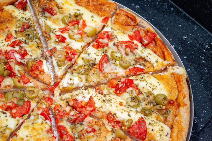 Overhead shot of a pizza with many toppings