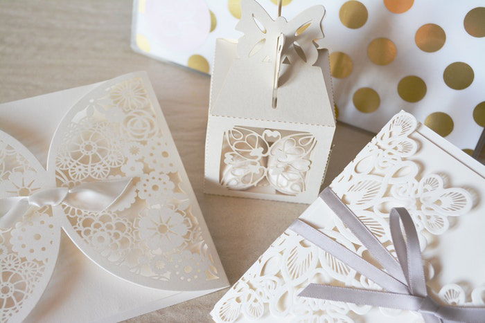 A still life of white wedding stationary