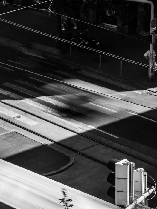 Black and white shot of an empty street scene in Budapest